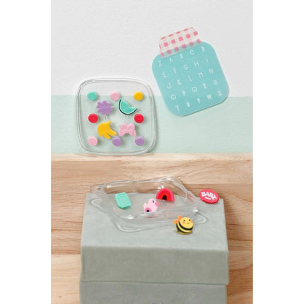 BABY born Babytrage mit aufsteckbaren Verzierungen